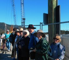 group at stingray creek bridge with construction ongoing